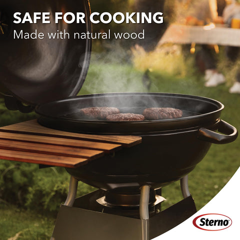 Sterno fire starter under charcoal demonstrating quick ignition.