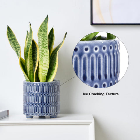 STHIE 5-inch ceramic planter features art stripes and a crackle finish.