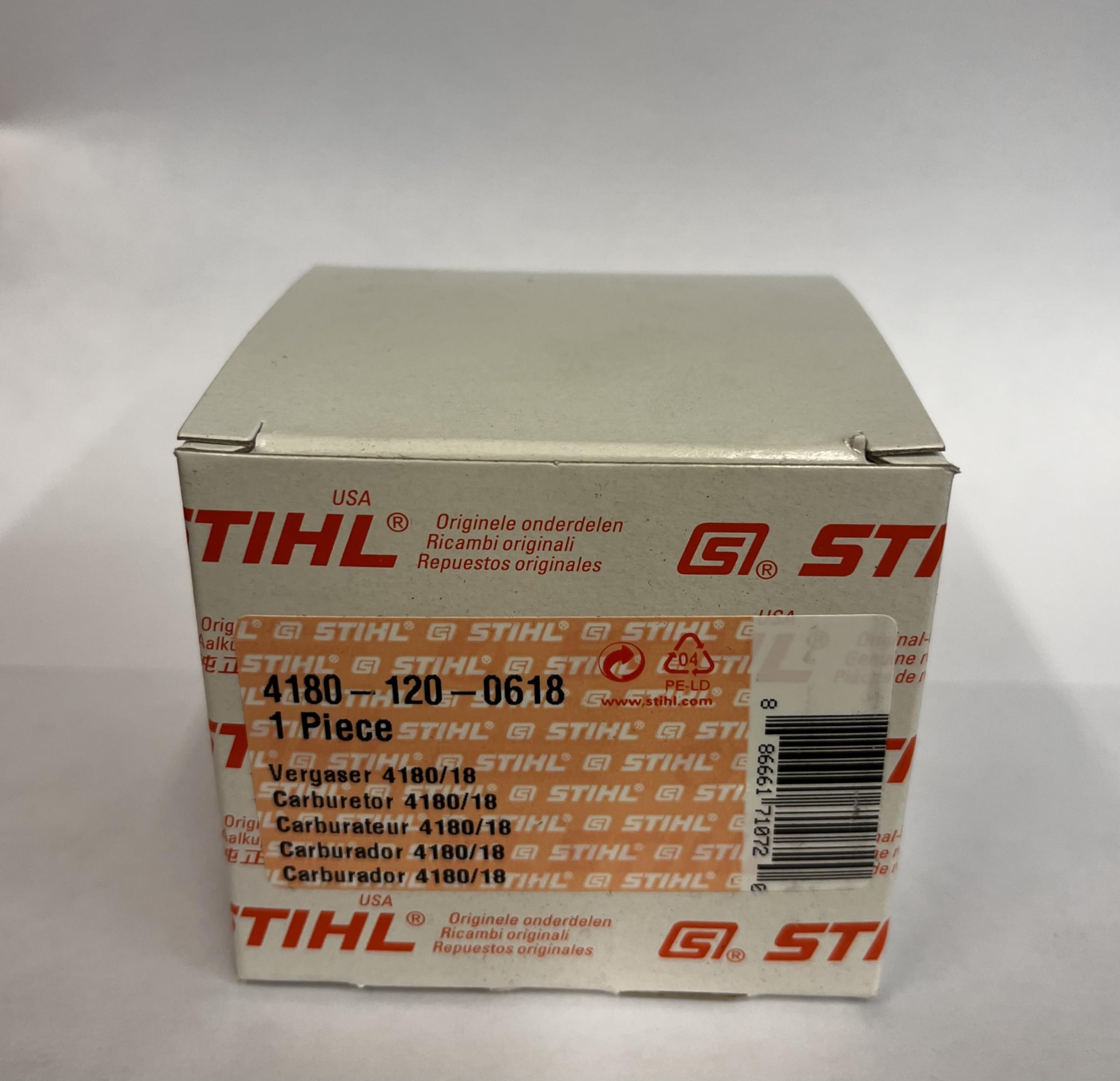 Stihl 0618 OEM carburetor close-up in silver, ready for replacement.