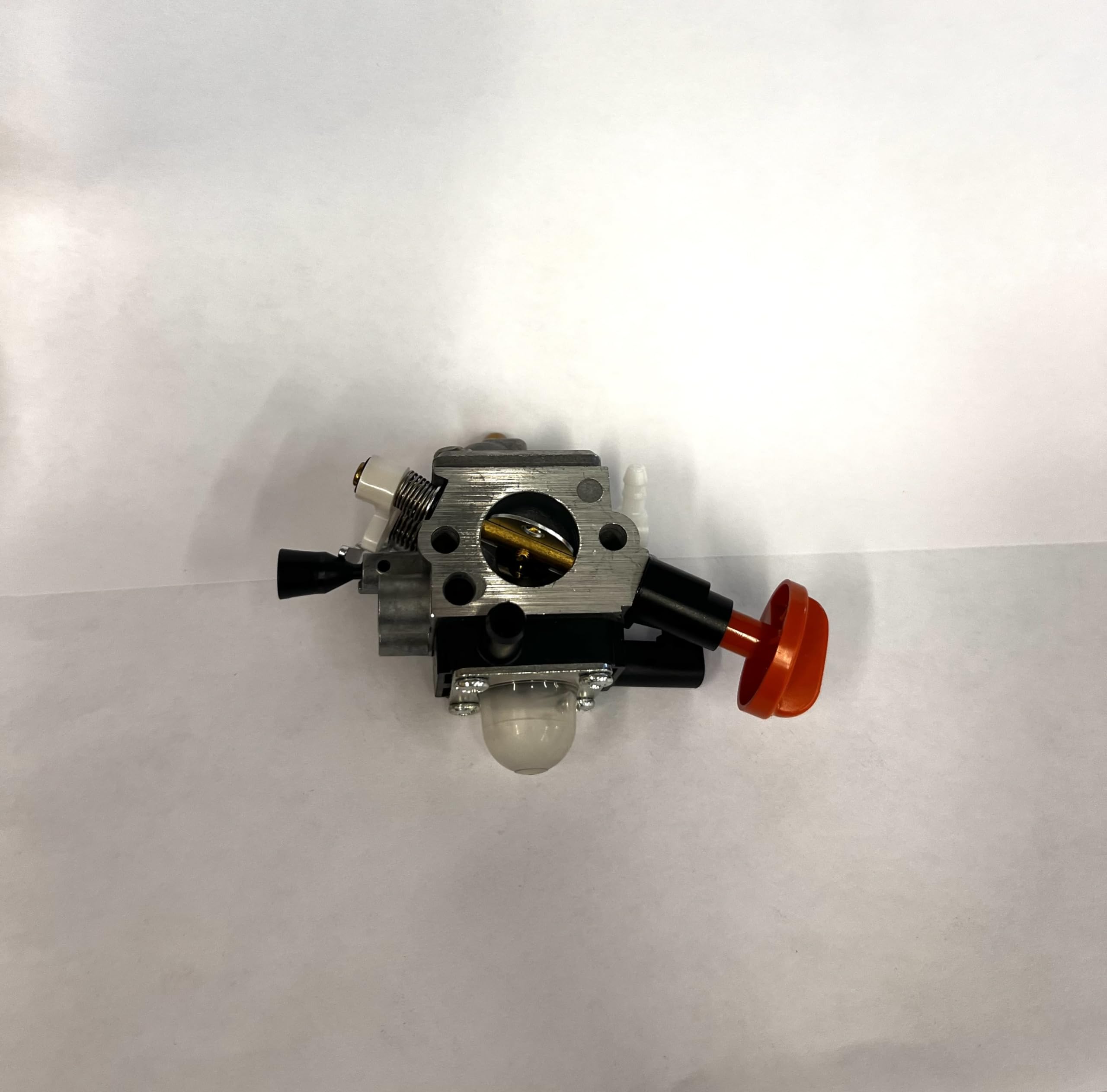 Stihl 0618 OEM carburetor detail in silver finish, designed for durability.