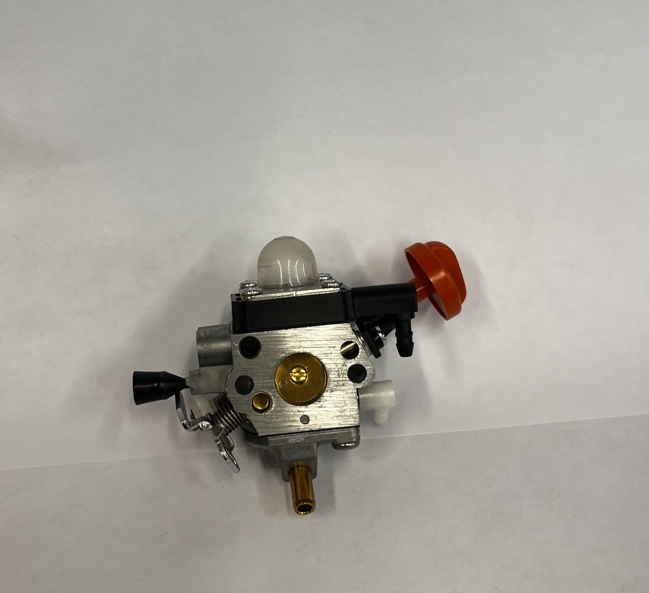 Stihl 0618 OEM carburetor side view, showing precise fit for compatible models.