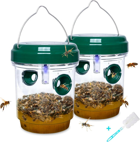 Stingmon wasp trap outdoor hanging with solar panel providing daylight charging for garden protection.