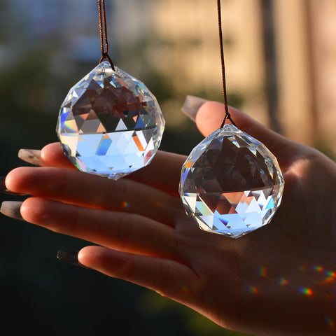 Stino clear ball crystal sun catcher prisms illuminate windows with rainbows.