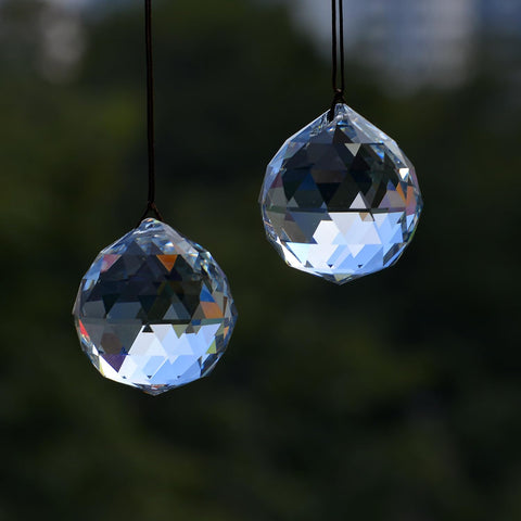 Stino rainbow-maker crystal prism creates colorful light spots when sun angles.
