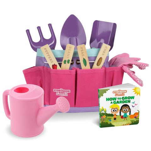 The Storybook Kids Explorers Club pink tote bag keeps tools organized for outdoor play.