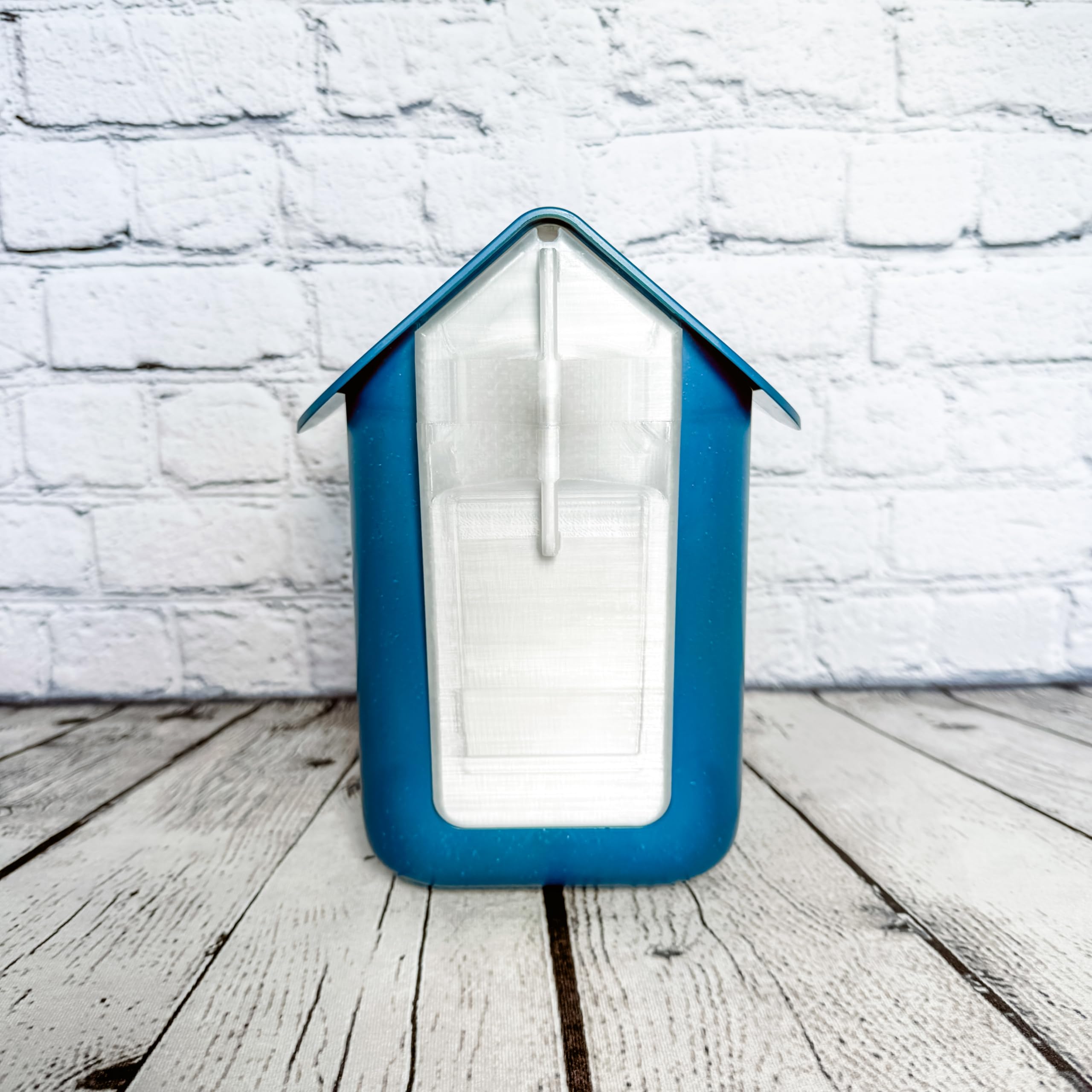 StramMade Bird Buddy ball-chain tether keeps the door handy during refills.