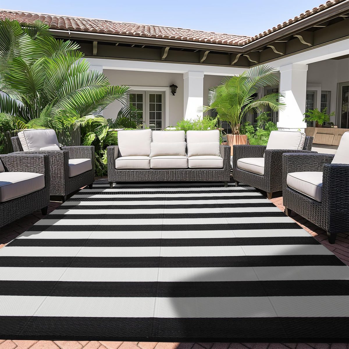 Strickland Home outdoor rug 8x10 laid flat on a patio for durable all-weather performance.