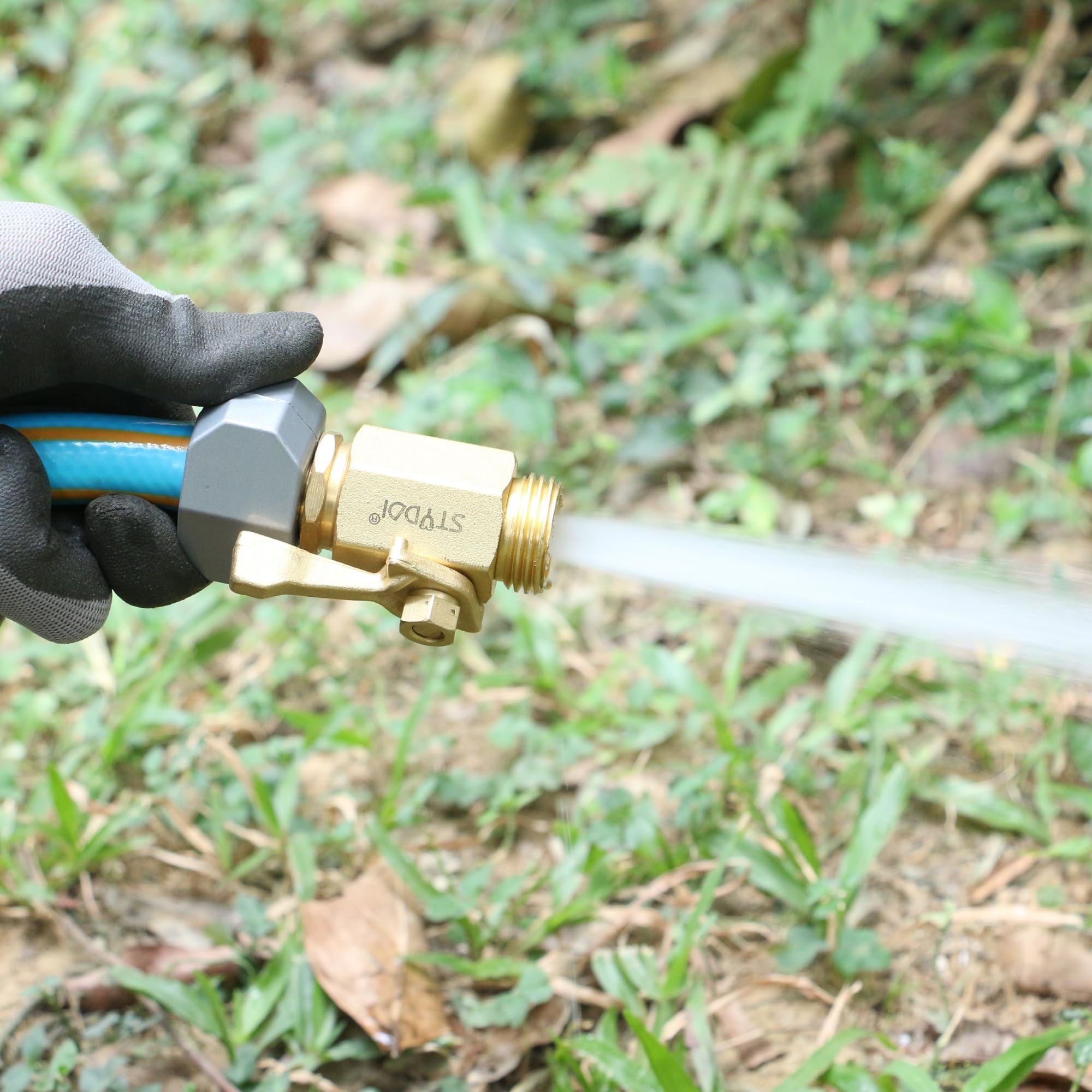STYDDI brass valve attached to a standard garden faucet