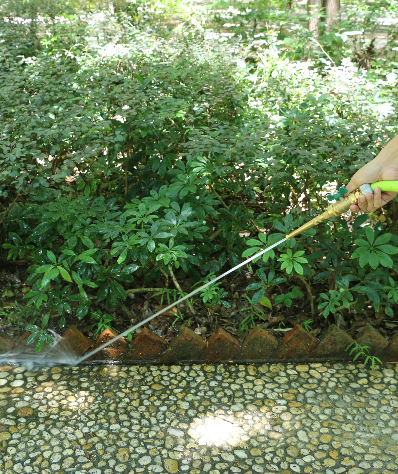 STYDDI water spray demonstrates versatile outdoor cleaning performance.
