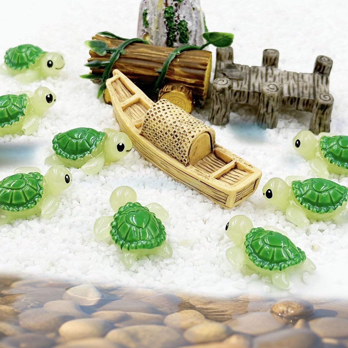 Suartus micro landscape turtle figurines on a miniature setup.