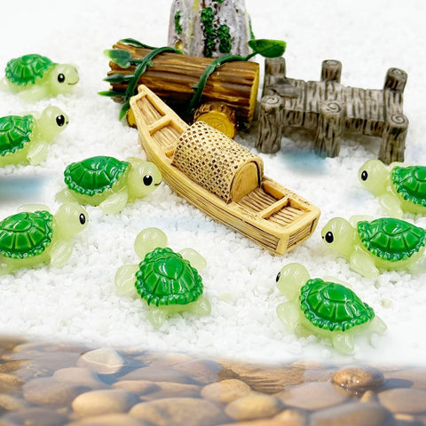 Suartus micro landscape turtle figurines on a miniature setup.