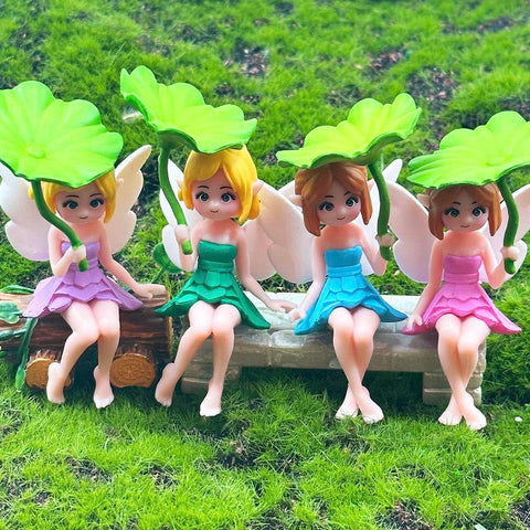 Suartus miniature fairies decorate moss landscapes and terrariums with subtle color