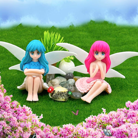 Suartus resin fairy figurines close-up showing detailed texture.