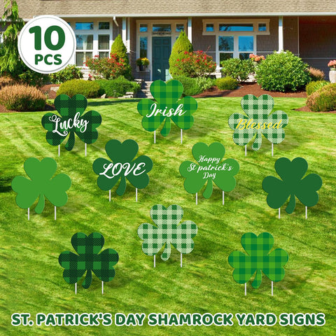Subacy yard sign close-up with bright green shamrock pattern.