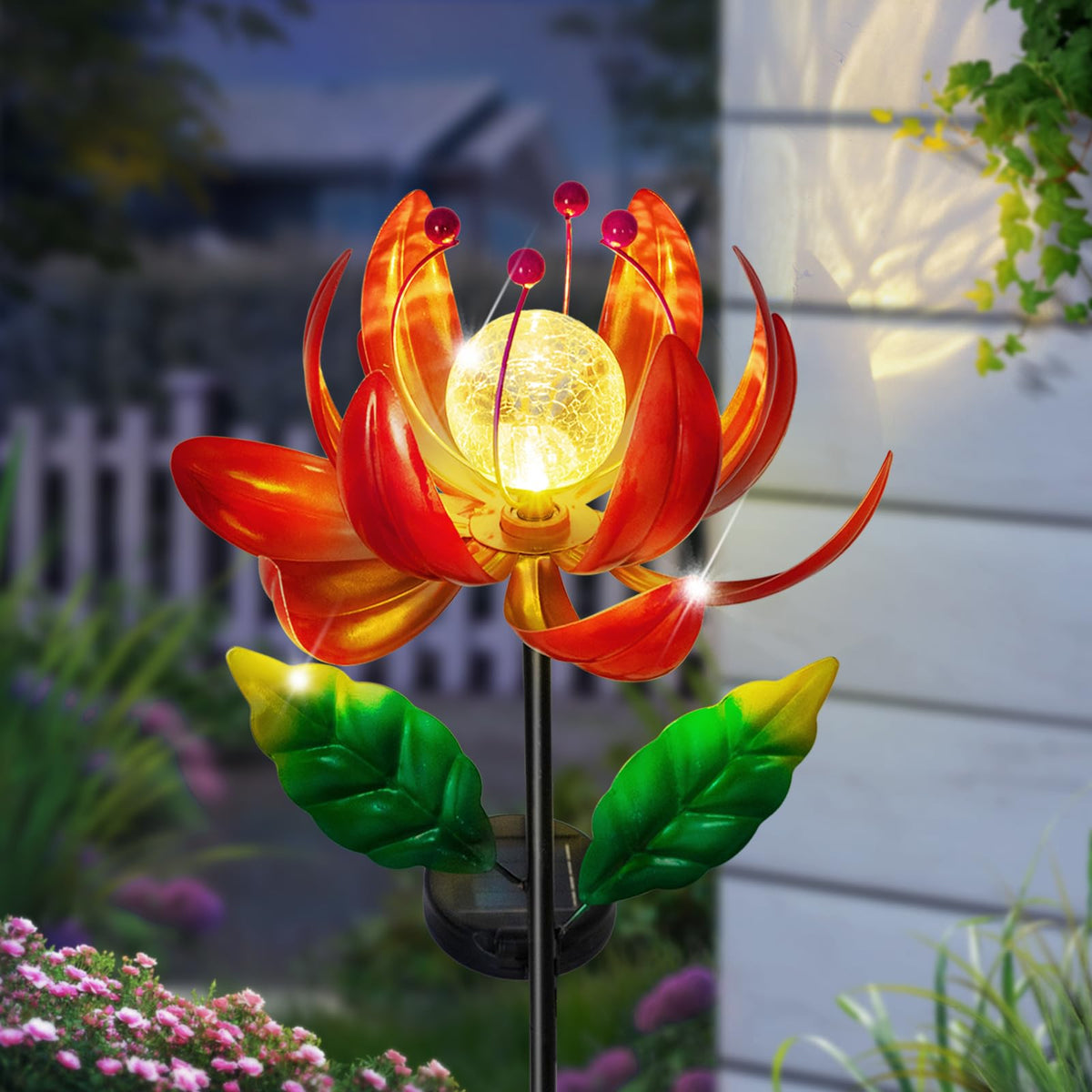 SUCUY solar wind spinner with lotus globe glows softly for patios