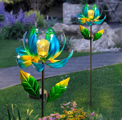 SUCUY warm white glow brightens paths and flower beds after sunset.