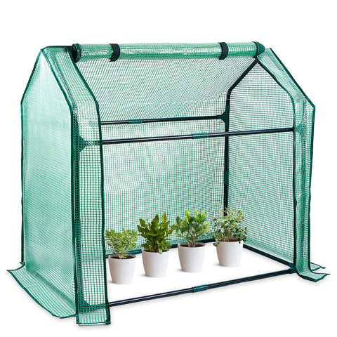 SUMGROW Mini Greenhouse tabletop setup demonstrates compact gardening capability for small spaces.
