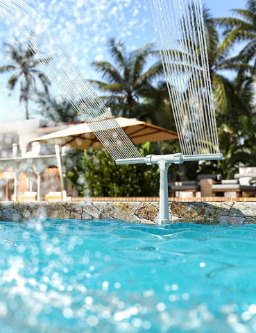 SUMMERBUDDY waterfall direction control illustrates adjustable spray height and direction.