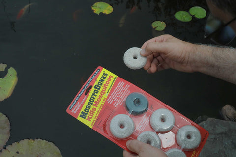 Summit Mosquito Dunk Tablet applied to standing water to deter larvae.