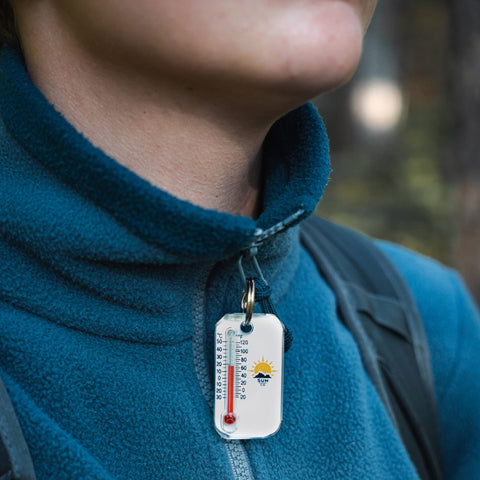 Zip-o-gage clipped to a backpack ready for trail temperature checks