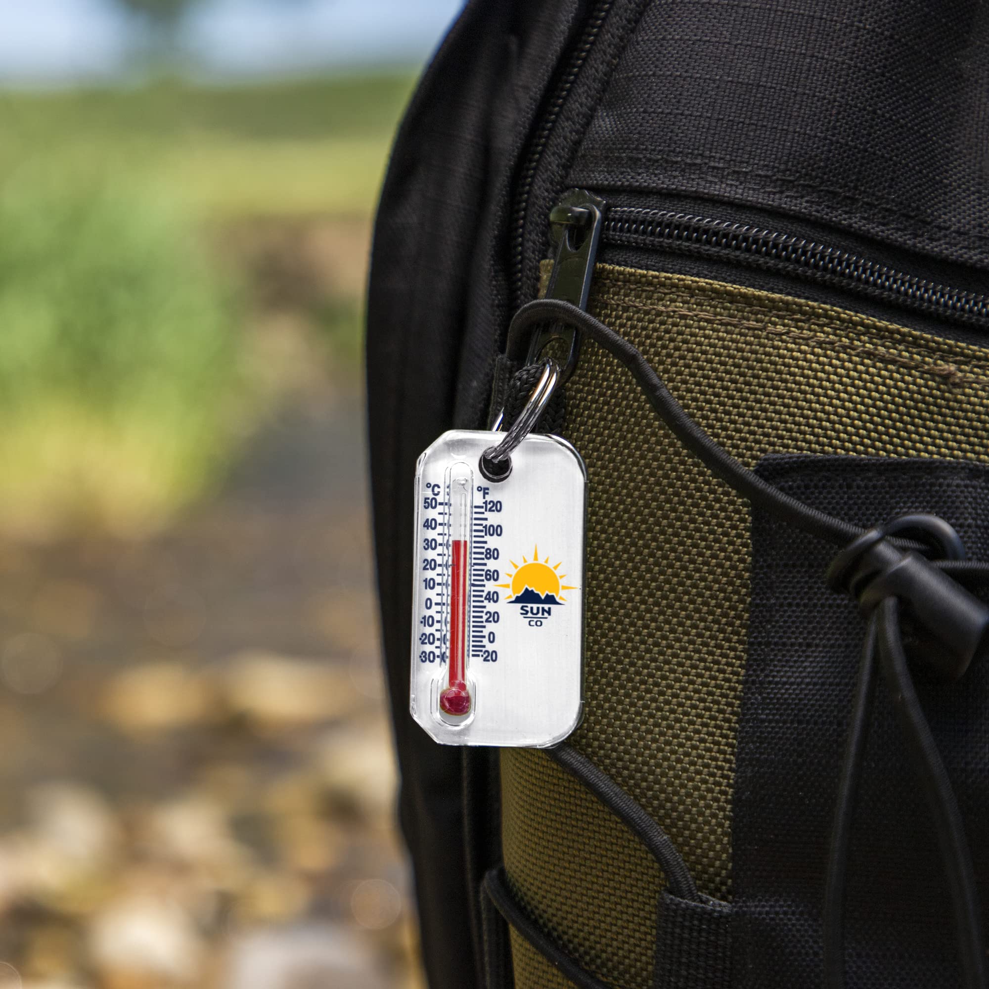 Zip-o-gage keyring attachment kept handy on a travel bag