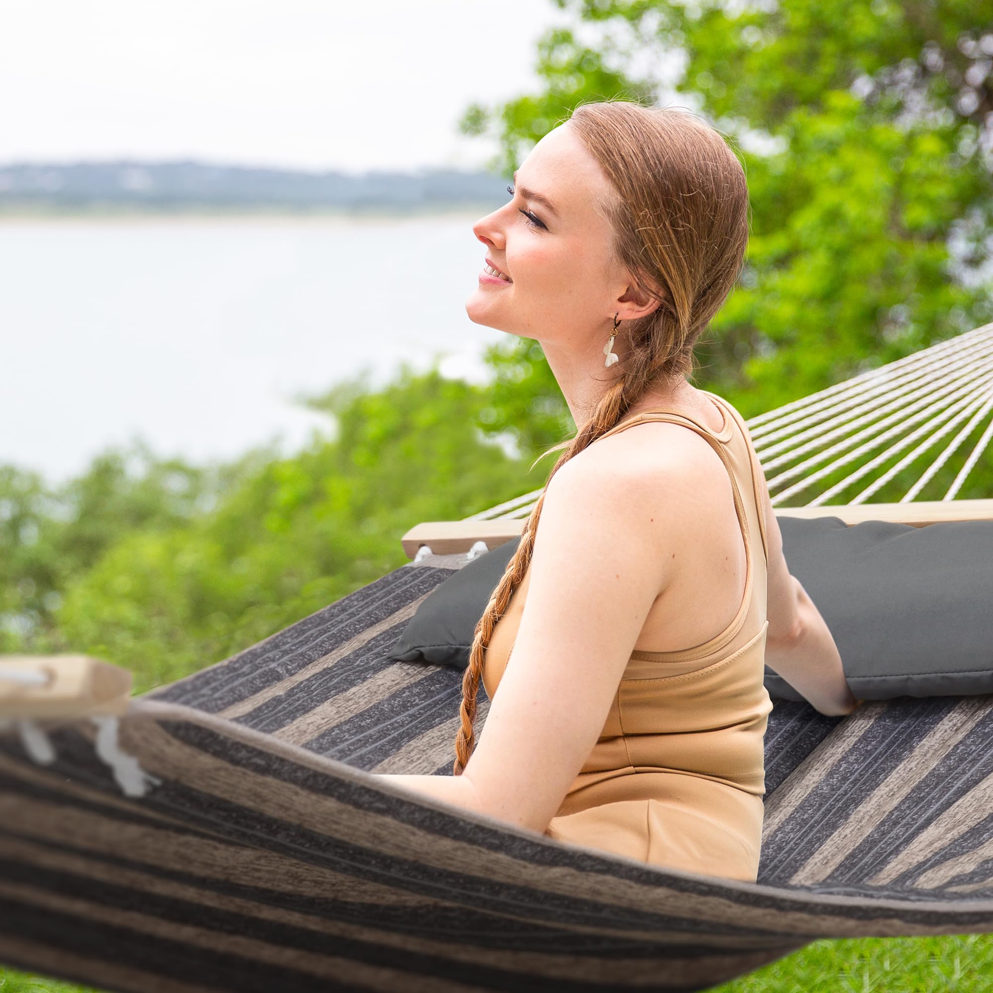 SUNCREAT head pillow provides plush support during relaxed outdoor naps.