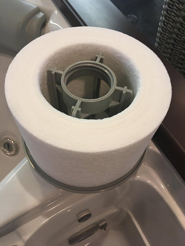 Sundance Microclean I throwaway filter no cleaning required install and replace as needed.