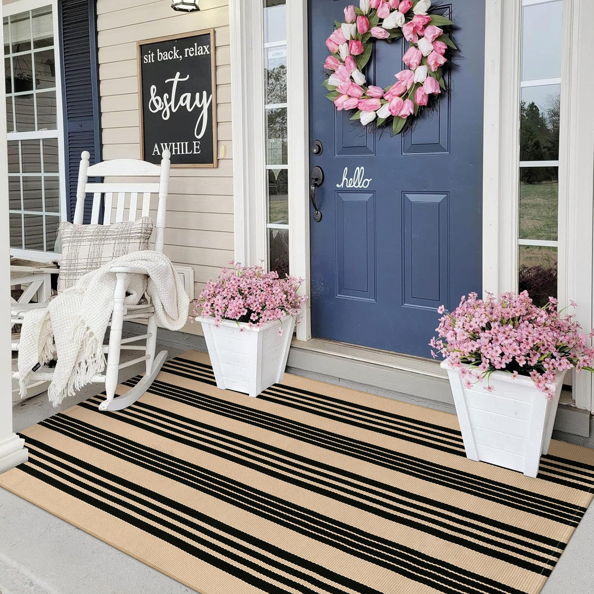 Sungea black and khaki striped rug for the front door adds curb appeal.