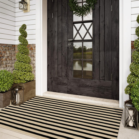 Sungea outdoor striped rug 3x5 in black and tan adds curb appeal to entryways