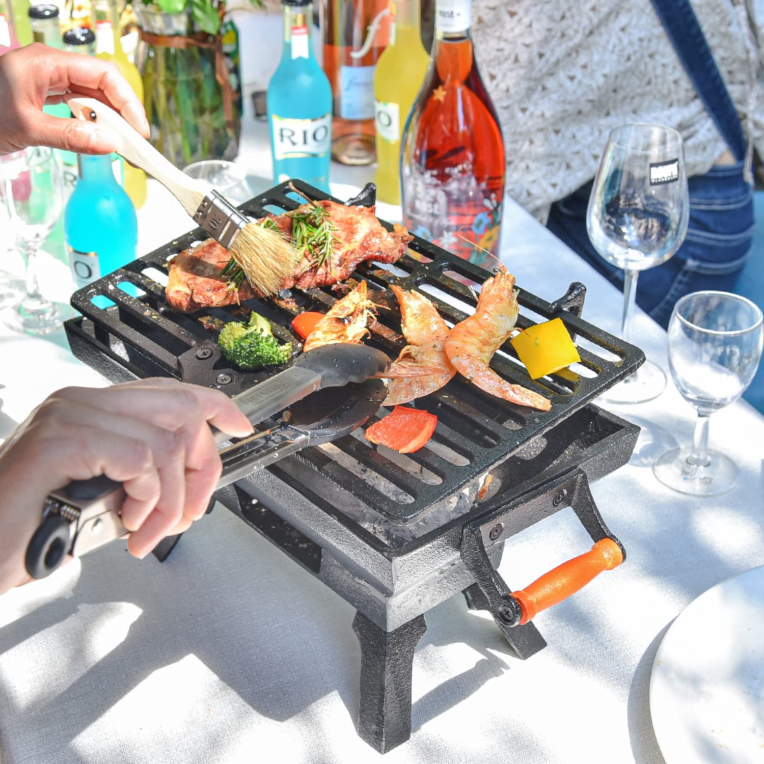Sungmor cast-iron grill surface provides 12x7 inch cooking area for small gatherings.