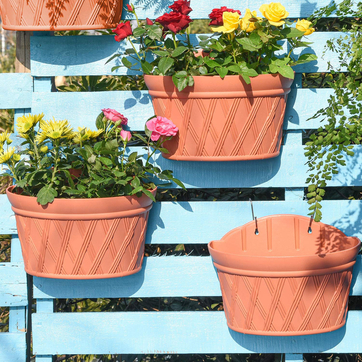 Sungmor brick-red wall-hanging planter front view for balcony décor.