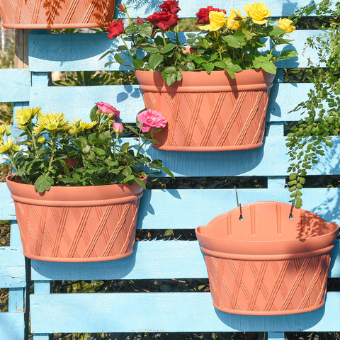 Sungmor brick-red wall-hanging planter front view for balcony décor.
