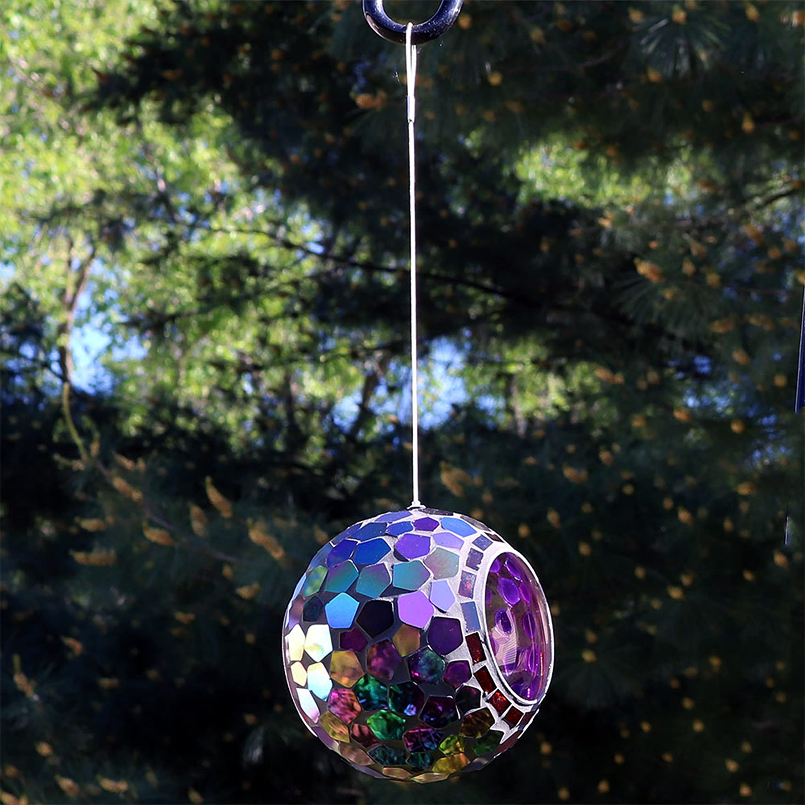 Sunnydaze Garden scene with feeder showcases vibrant patio decor and wildlife enjoyment.