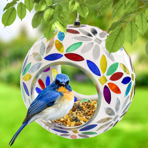 Sunnydaze decorative feeder enhances patios with vibrant sunlight reflections.