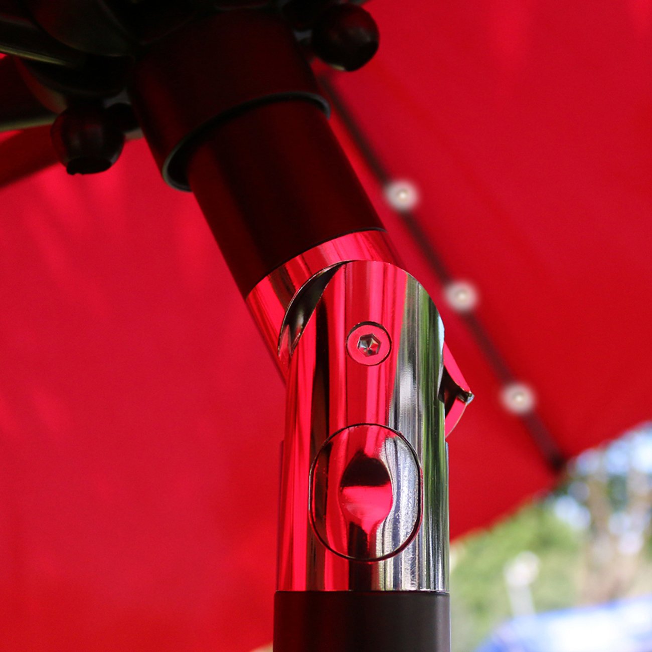 Sunnyglade 9' solar LED umbrella tilt and crank mechanism in action for easy use.
