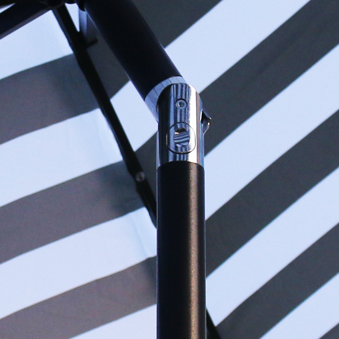 Sunnyglade fade-resistant canopy in black and white offering lasting shade.