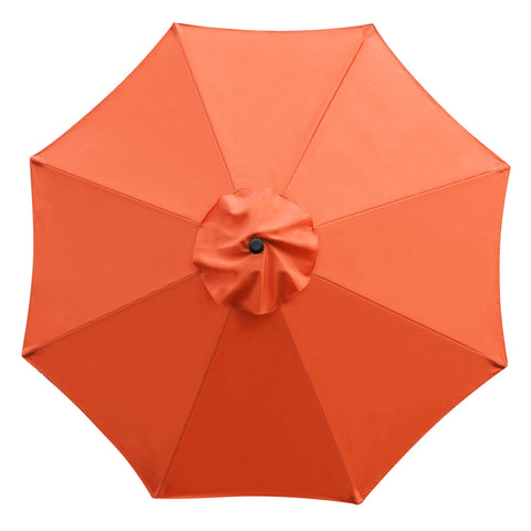 Sunnyglade orange umbrella beside table with chairs outdoors.