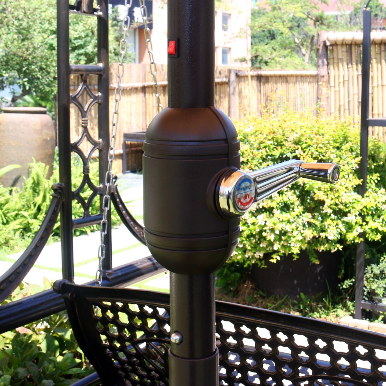 sunnyglade teal umbrella with LEDs along ribs for ambient nighttime illumination.