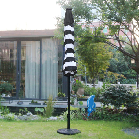 Sunnyglade 9-foot diameter umbrella shading a 48-inch table.