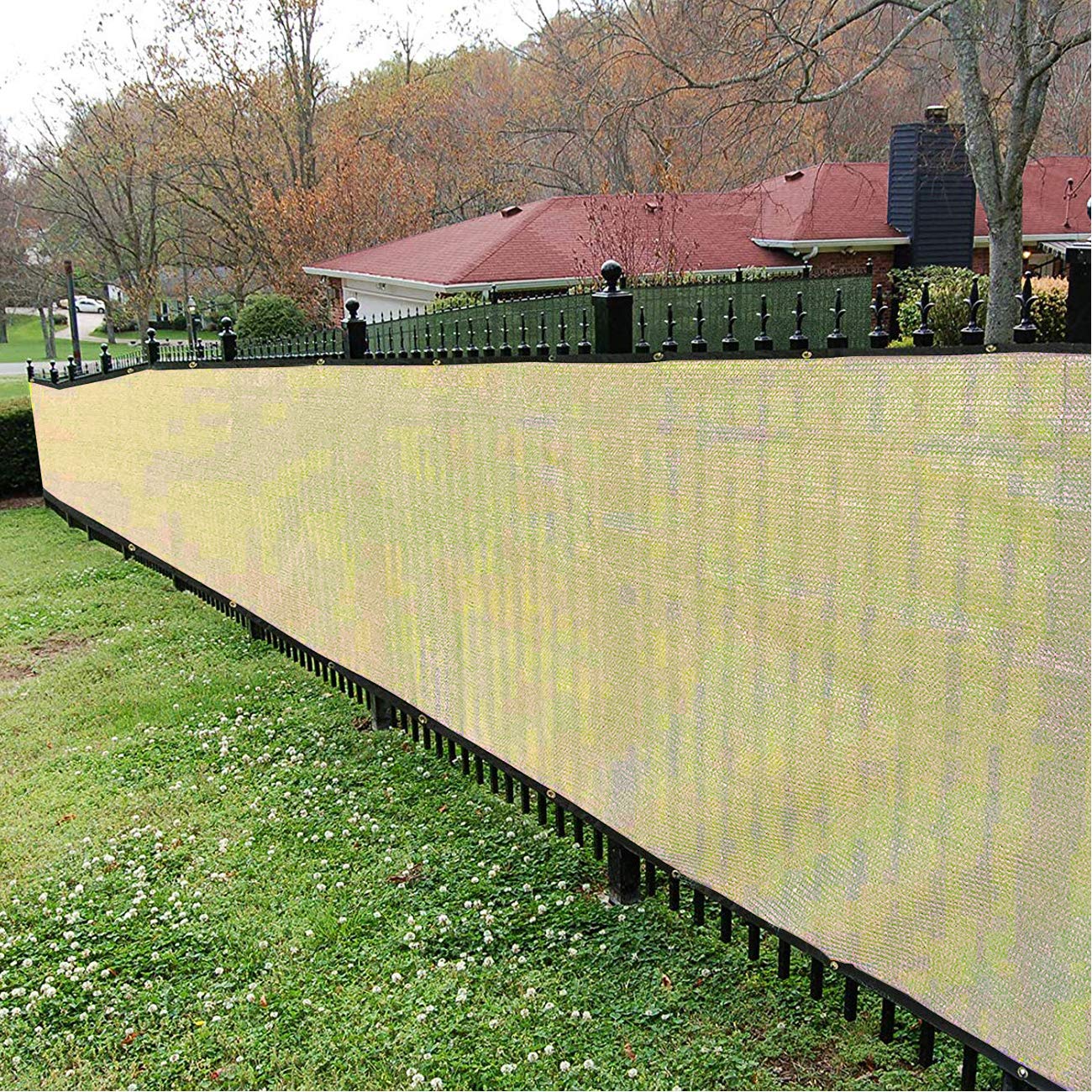 Sunnyglade privacy screen in use in a yard blocks view while airflow remains.