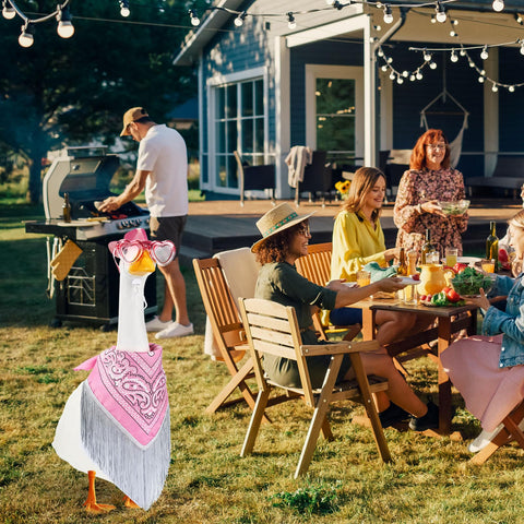 Vintage pink accents from Sunnymove goose outfit for a charming, retro garden centerpiece.