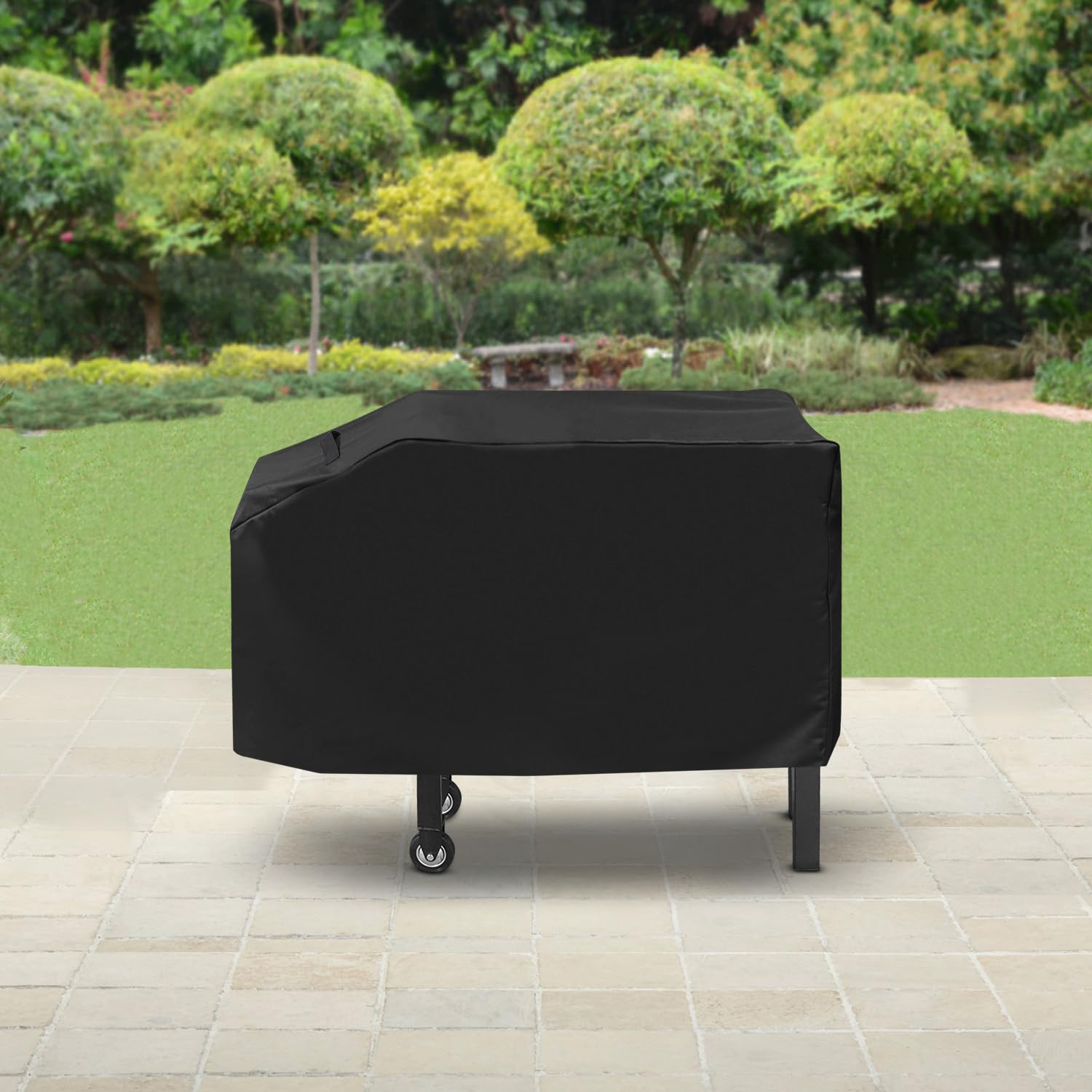 SunPatio in-use cover protects the grill on a sunny patio