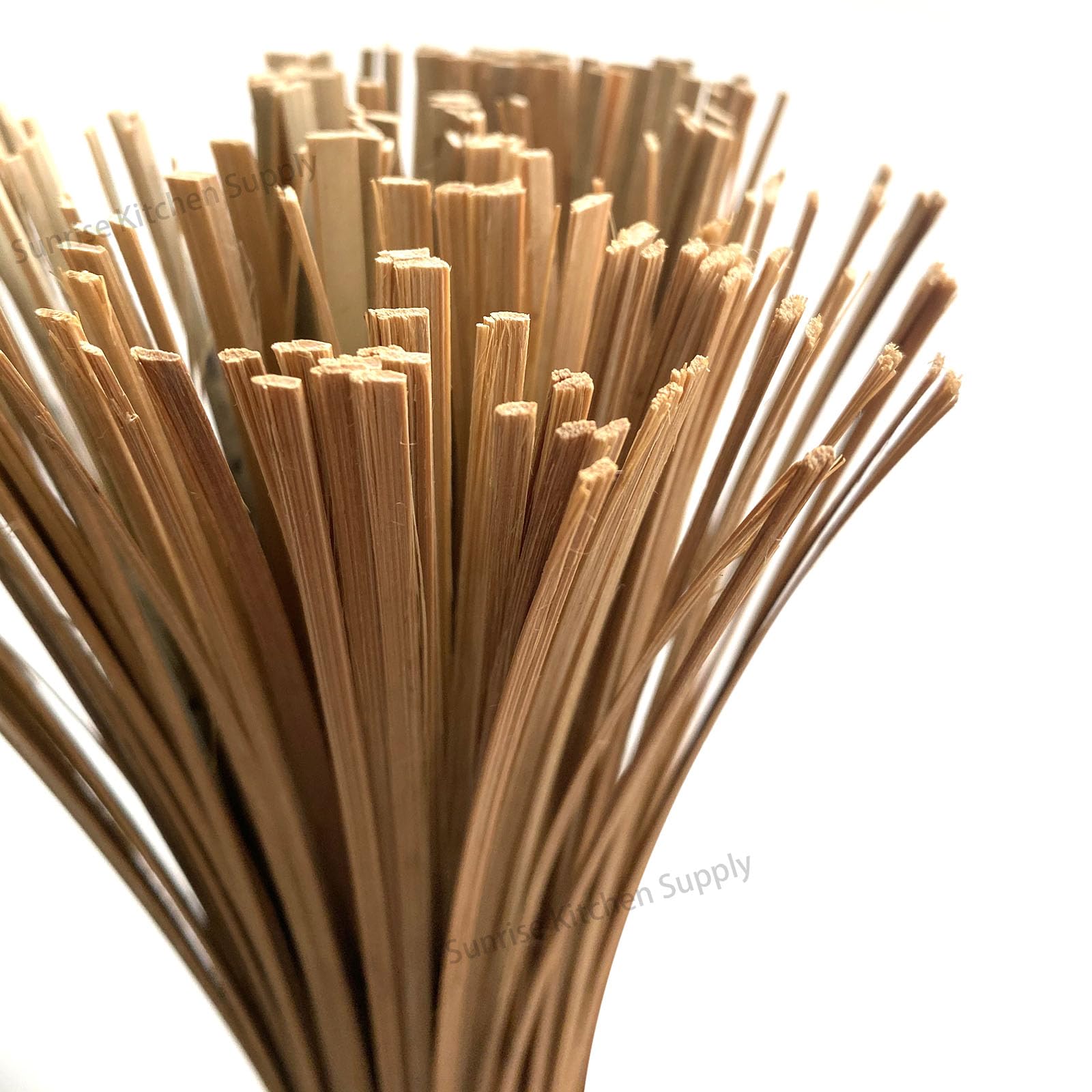 SUNRISE Bamboo Wok Brush tackles burnt-on residue safely on hot surfaces.