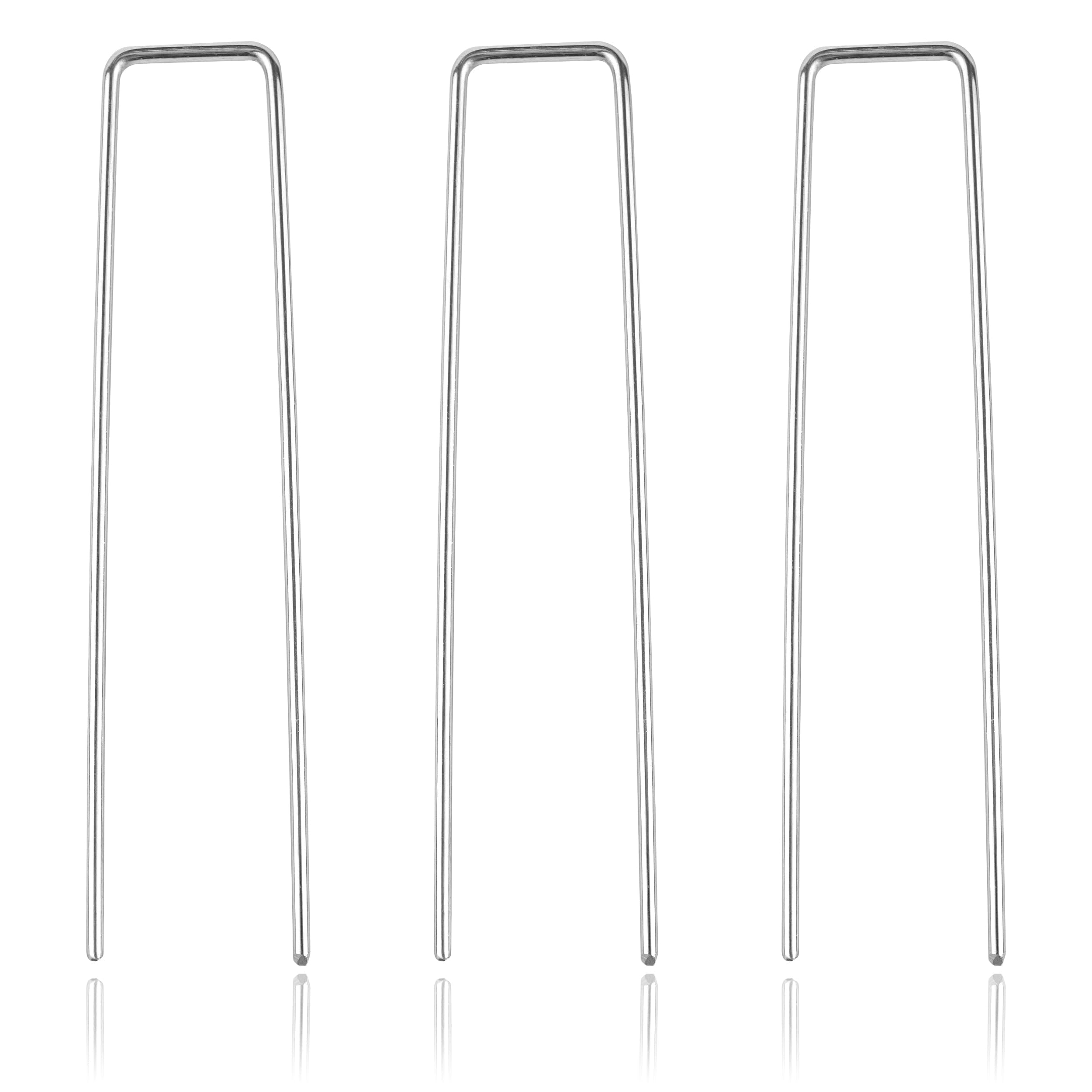 Super Geotextile lawn pin secures drip irrigation tubing neatly.