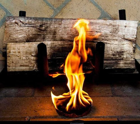 SUPERCEDAR FIRESTARTERS wood stove setup illustrates clean burning and simple placement.