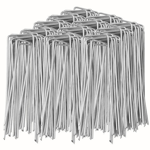 SuperMMarK 6-inch garden stakes securing a lawn edge with strong 11-gauge steel.