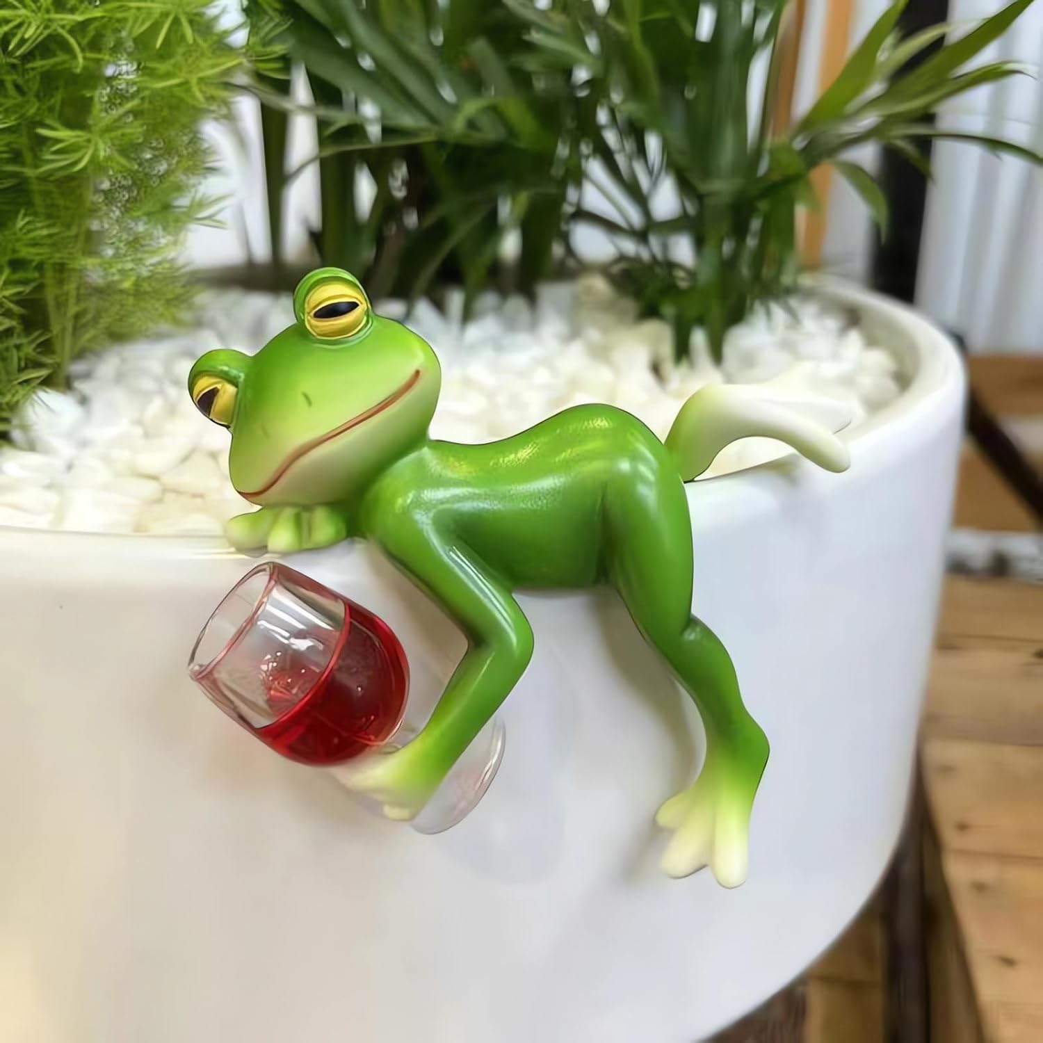 Suqorinp miniature frog figurine perched on a pot adding garden charm