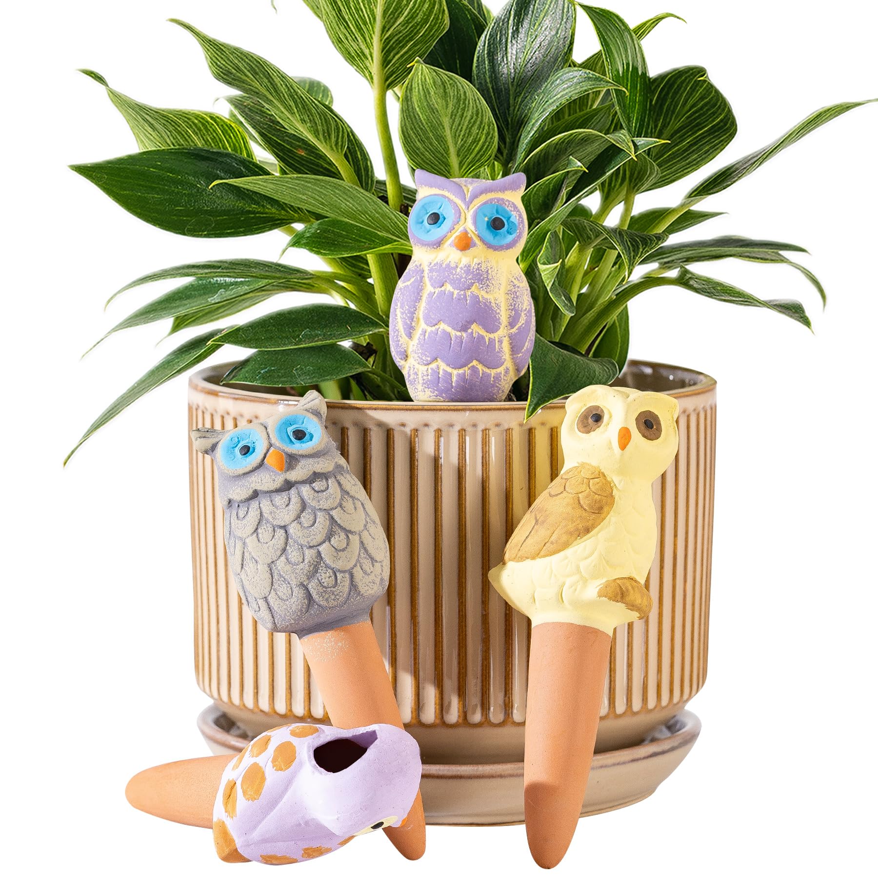 Sure Yuesi terracotta owl watering spike keeps soil evenly moist for healthy indoor plants.