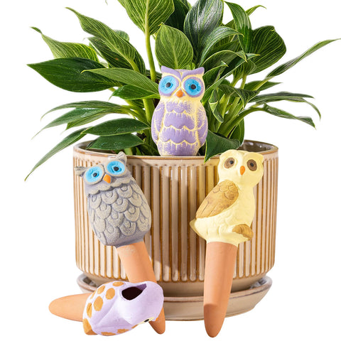 Sure Yuesi terracotta owl watering spike keeps soil evenly moist for healthy indoor plants.