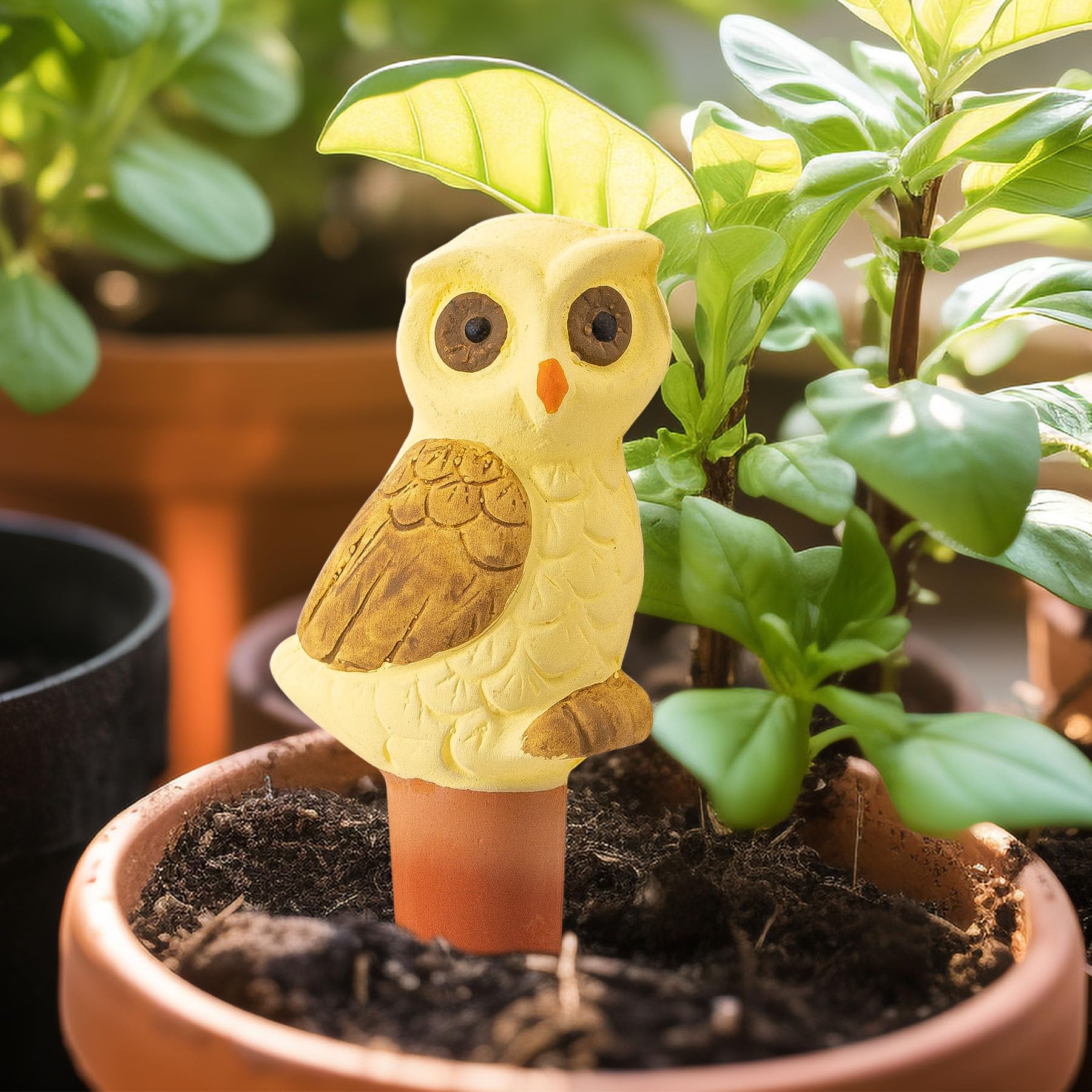 Sure Yuesi owl-globe watering spike set fits pots, baskets, and garden beds for versatile hydration.